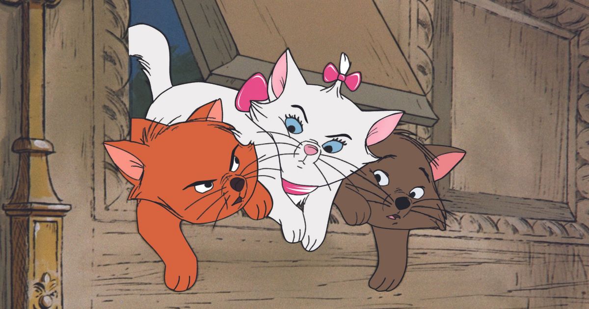 Three cats try to squeeze through the mail slot in the door in Aristocats