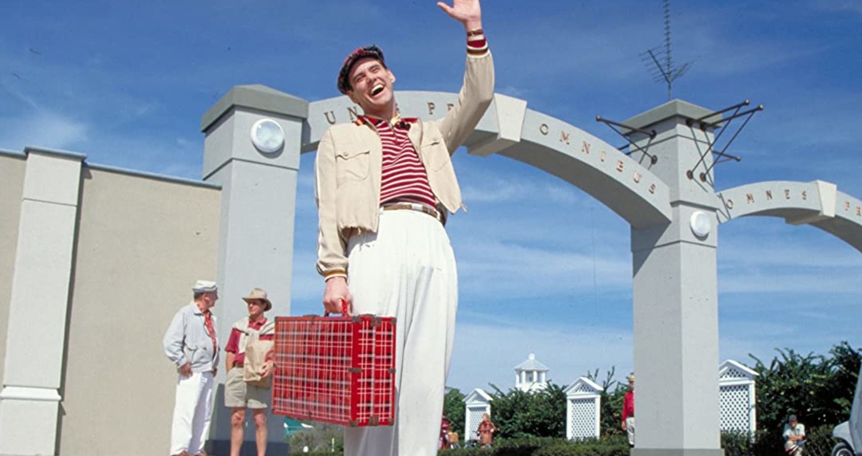Jim Carrey waving in The Truman Show 