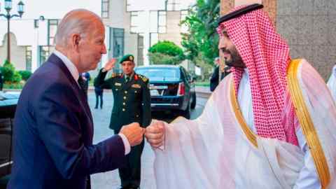 President Joe Biden and Saudi Crown Prince Mohammed bin Salman greet each other with a fist bump.