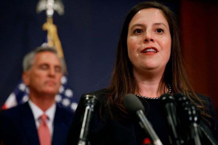 New York congresswoman Elise Stefanik, with ousted Speaker Kevin McCarthy behind her, 